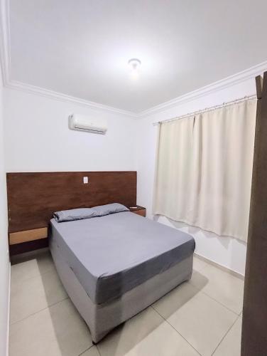 Postel nebo postele na pokoji v ubytování Residencial Ernesto Neves - 5 min da praia de Bombas