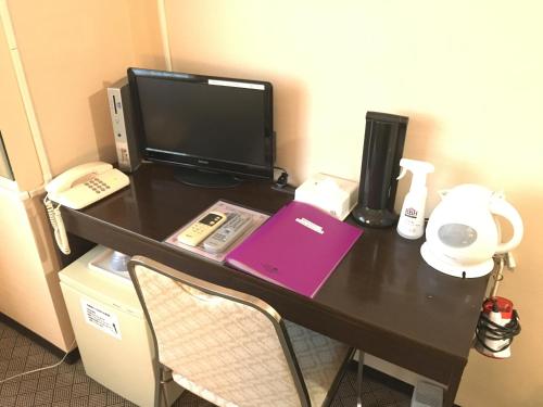 TV a/nebo společenská místnost v ubytování Hotel Furukawa Hills