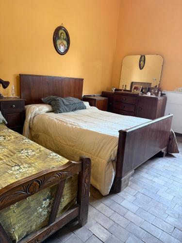 En eller flere senge i et værelse på Casa Quinta en Colonia Caroya