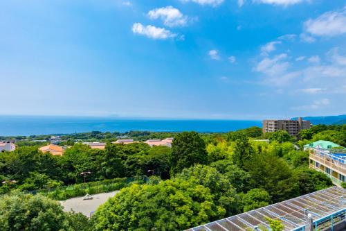 a view of the ocean from the roof of a building at YU-FURI Izukogen in Ito