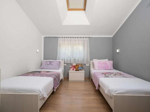 Postel nebo postele na pokoji v ubytování Mare & Monti Istra