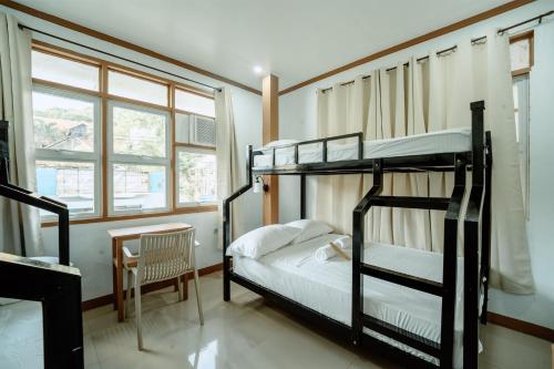 Postel nebo postele na pokoji v ubytování Mia Bae Lodge