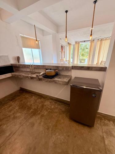 Η κουζίνα ή μικρή κουζίνα στο OLA Tangalle