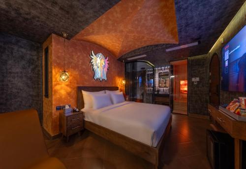 Postel nebo postele na pokoji v ubytování Pynt Hotel 6