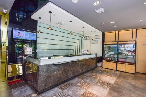 Kuchyň nebo kuchyňský kout v ubytování Jinjiang Inn Style Shijiazhuang Zhongshan Xi Road Yuxi Park