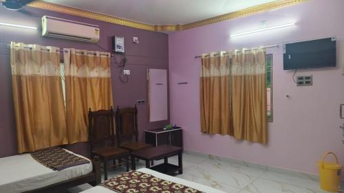 Μια τηλεόραση ή/και κέντρο ψυχαγωγίας στο Guru Residency Pondicherry