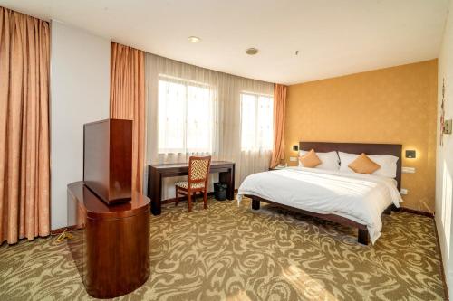 Postel nebo postele na pokoji v ubytování Xin Hua Hotel Guangzhou