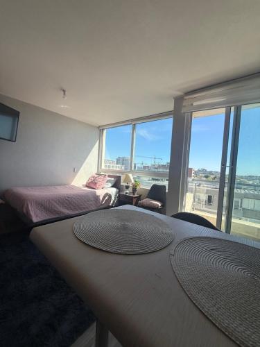 En eller flere senge i et værelse på Vista Urbana y Laguna Concepción