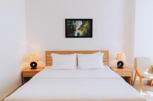 Ένα ή περισσότερα κρεβάτια σε δωμάτιο στο Hotel De Decembre