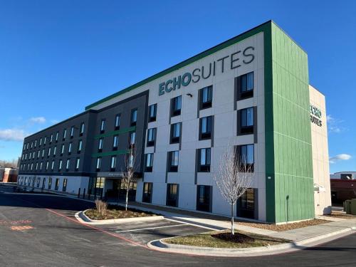 a large building with the words eskimo properties on it at ECHO Suites Extended Stay by Wyndham Springfield Airport PLZ in Springfield