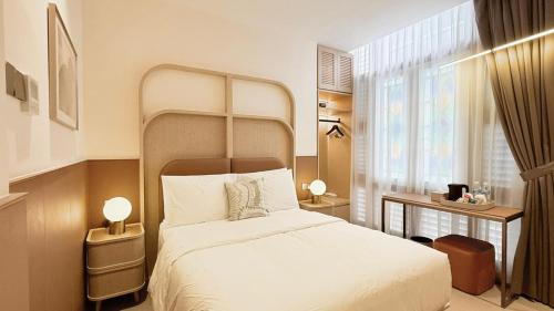 En eller flere senge i et værelse på SOCIAL on Mayo