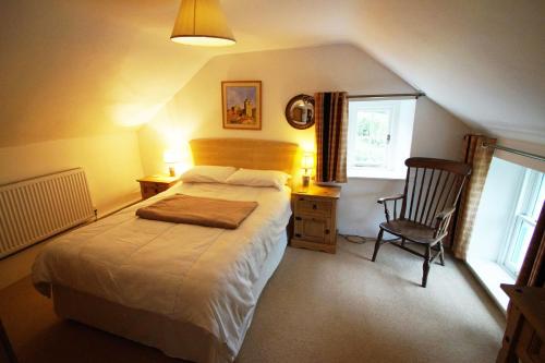 Postel nebo postele na pokoji v ubytování Bwthyn Amroth