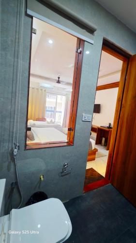 Et badeværelse på Hotel Tapomay Retreat