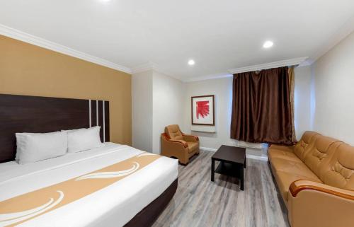 Postel nebo postele na pokoji v ubytování Quality Inn Long Beach - Signal Hill