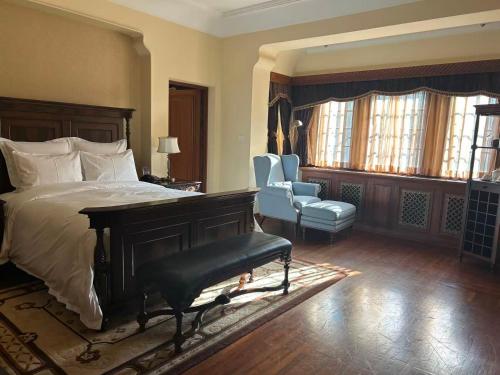 Postel nebo postele na pokoji v ubytování Guitang Ding's Mansion - D'CONG Heritage