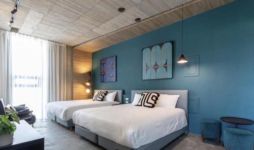 En eller flere senge i et værelse på 吳老闆民宿