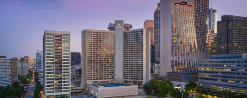 a group of tall buildings in a city at Hilton Atlanta in Atlanta