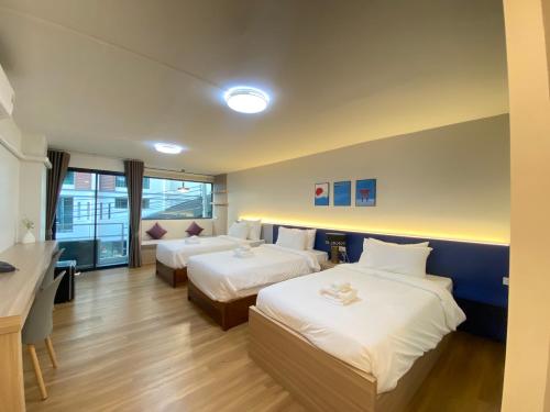 Ένα ή περισσότερα κρεβάτια σε δωμάτιο στο Chorbnorn Hotel