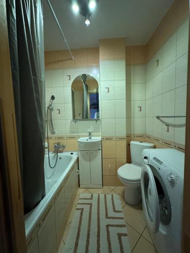 Et badeværelse på Lakes & Castles Apartment