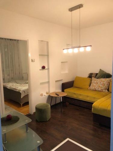 Et opholdsområde på Apartman Tea