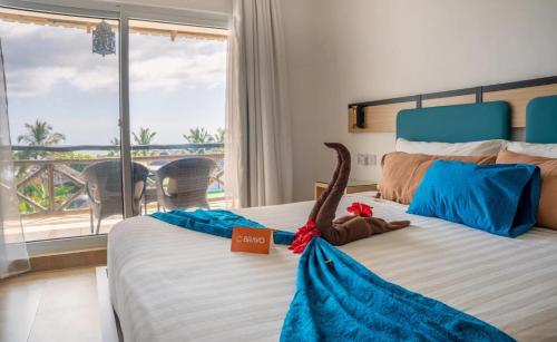 En eller flere senge i et værelse på Canary Kendwa Beach Resort