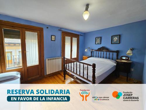 En eller flere senge i et værelse på Apartamentos Jaca Ciudadela 3000