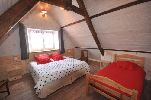 Postel nebo postele na pokoji v ubytování Moulin de la Fosse Soucy "Les Merisiers"