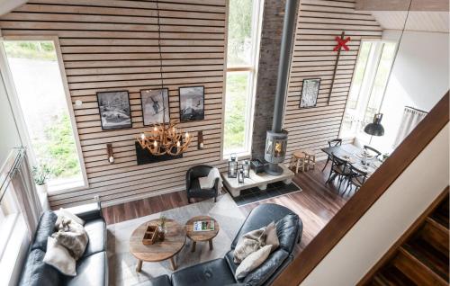 Et opholdsområde på Awesome Home In Transtrand With Sauna