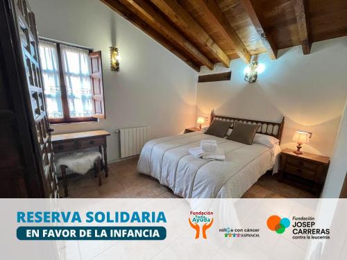 En eller flere senge i et værelse på Apartamentos Santillana - Mijares 3000