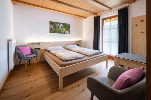 Postel nebo postele na pokoji v ubytování Veraltenhof Agriturismo B&B