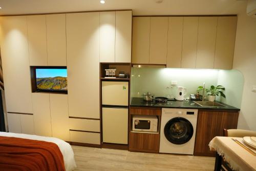 Kuchyň nebo kuchyňský kout v ubytování Aurelia Apartments HN