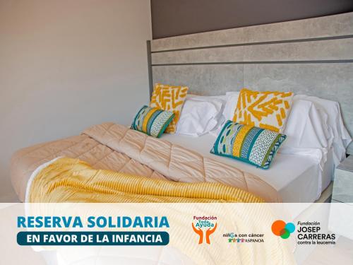 Postel nebo postele na pokoji v ubytování Apartamentos Santander Maliaño Suites 3000