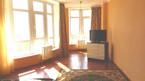 Μια τηλεόραση ή/και κέντρο ψυχαγωγίας στο Apartment in heart of Astana