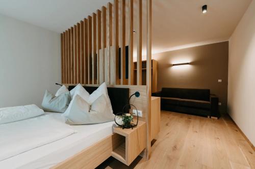 Postel nebo postele na pokoji v ubytování New Hotel Murrer