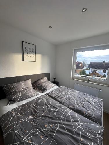 Postel nebo postele na pokoji v ubytování Hivent Ferienwohnungen