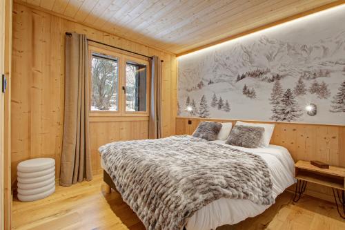 En eller flere senge i et værelse på Chalet Nivaria - Avec Jardin Privé