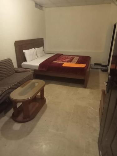 Voodi või voodid majutusasutuse All khair hotel toas