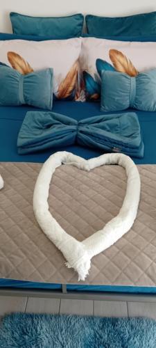 Postel nebo postele na pokoji v ubytování BOSCA SUITE