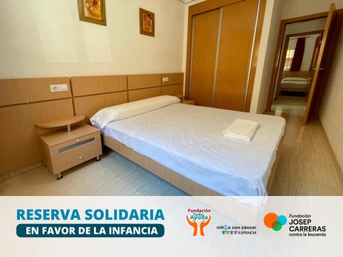 Giường trong phòng chung tại Apartamentos 3000 Marina D'Or