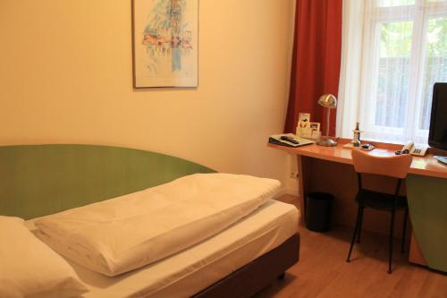 Katil atau katil-katil dalam bilik di Hotel Hansablick