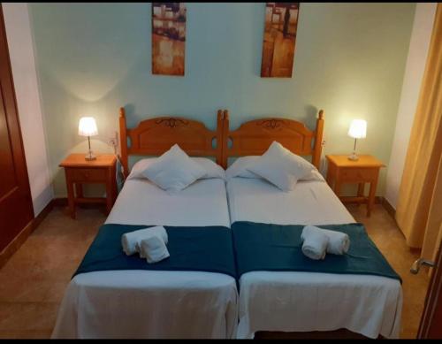 Кровать или кровати в номере Portal 17 Can Tort