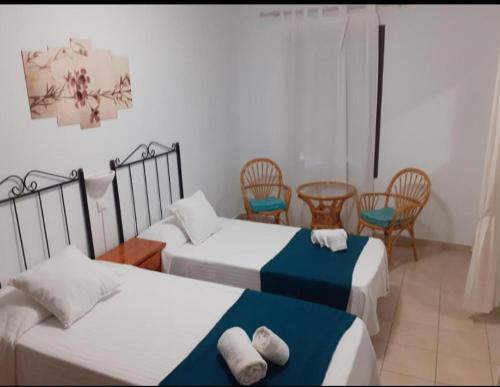 Кровать или кровати в номере Portal 17 Can Tort