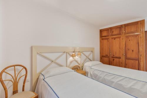 Postel nebo postele na pokoji v ubytování Playa Delphin 206