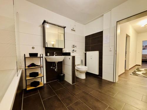 Et badeværelse på Stilvolles Wohlfühl-Apartment nahe Bahnhof