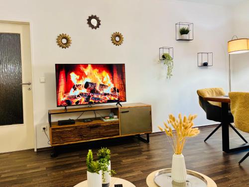 Et tv og/eller underholdning på Stilvolles Wohlfühl-Apartment nahe Bahnhof