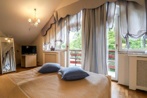 Ένα ή περισσότερα κρεβάτια σε δωμάτιο στο Guesthouse Trajbar Team