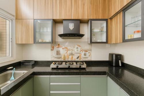 Køkken eller tekøkken på Darshan home Prime Connected Location