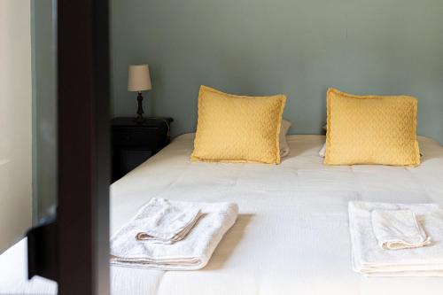 Letto o letti in una camera di L'Auberge des Clés