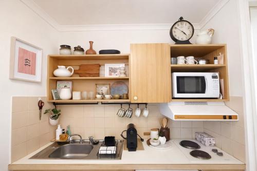 Køkken eller tekøkken på St Kilda Breeze Cosy Oasis