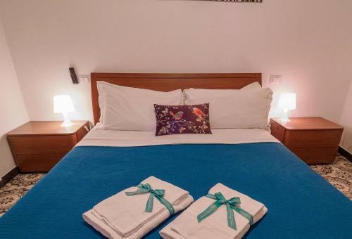 En eller flere senge i et værelse på Unda de Ma Apartment with AC & Sea View Balcony